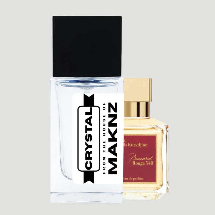 CRYSTAL by MAKNZ Perfumes luxury unisex fragrance inspired by Baccarat Rouge 540 displayed on an elegant crystal surface with amber reflections and premium lighting.